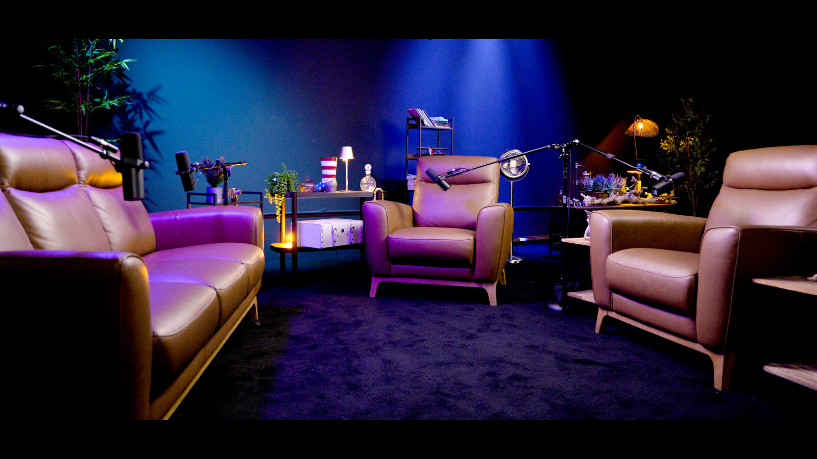 Lounge studio intimate recording setup with mood lighting