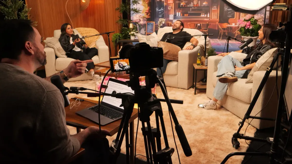 Three-guest podcast recording at The Lounge with café LED wall backdrop and cameras Sin City Podcast Studios Las Vegas