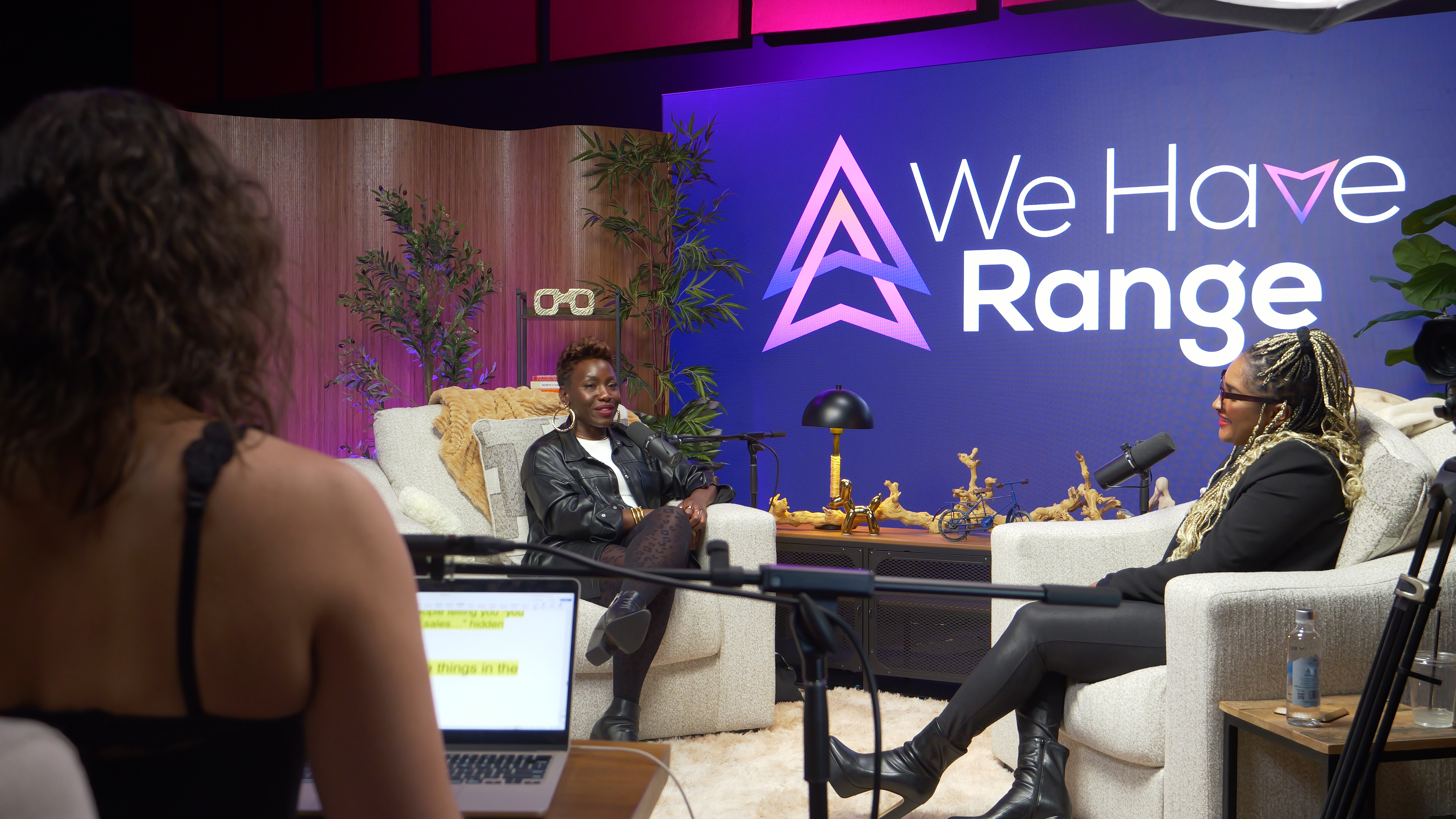 We Have Range podcast interview at The Lounge with custom LED wall branding Sin City Podcast Studios Las Vegas