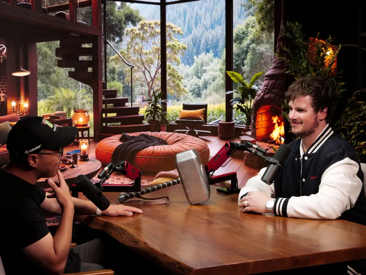 Podcast recording at The Roundtable studio with forest and fireplace LED wall display Las Vegas
