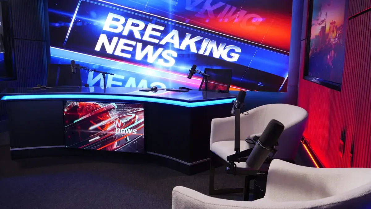 Studio 5 anchor desk wide angle with Breaking News LED wall and guest chairs Las Vegas